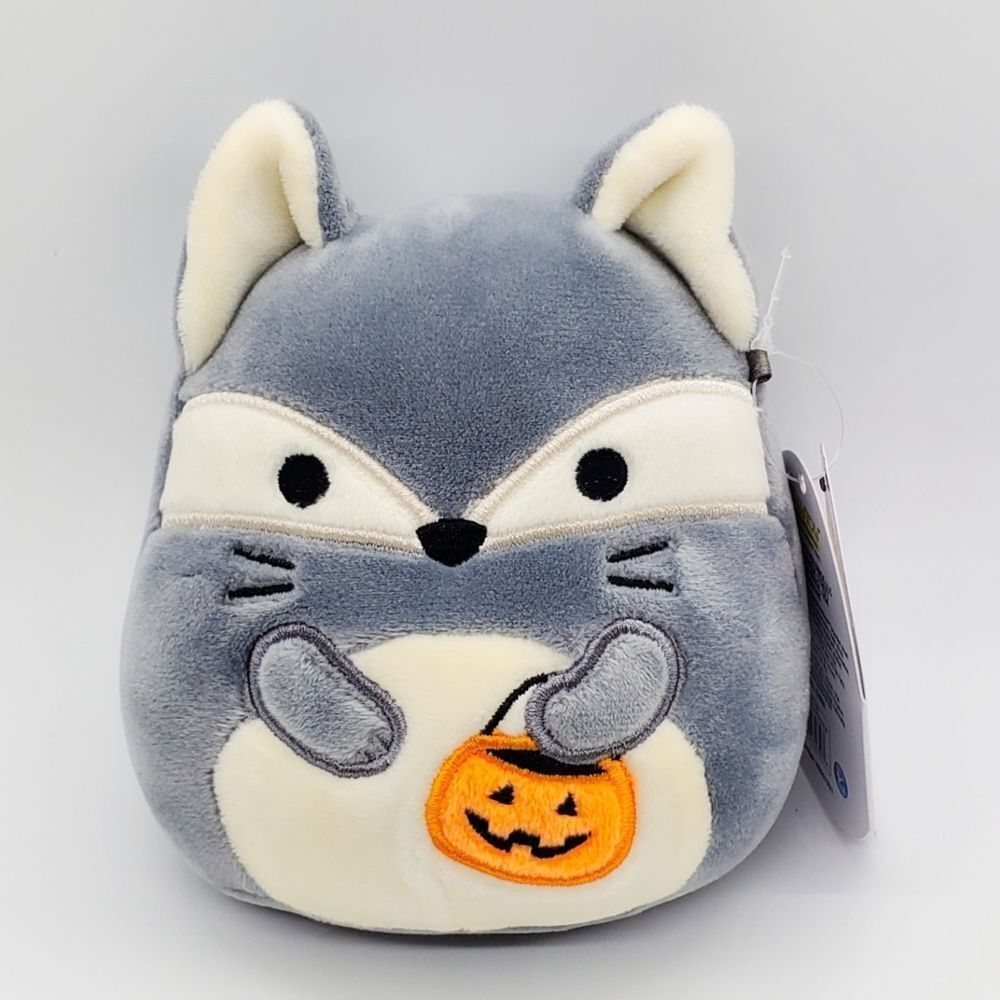 Squishmallow Floxie the fox holding pumpkin